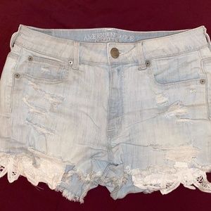 American Eagle Women's Light Washed Jean Shorts Hi-Rise Size 10 with Lace Detail